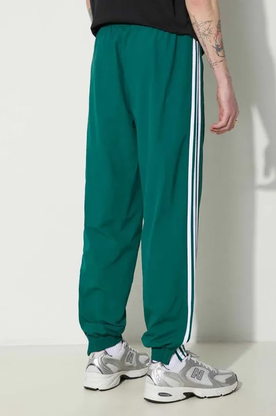 adidas Originals joggers Adicolor Woven Firebird Track Top green color IT2497