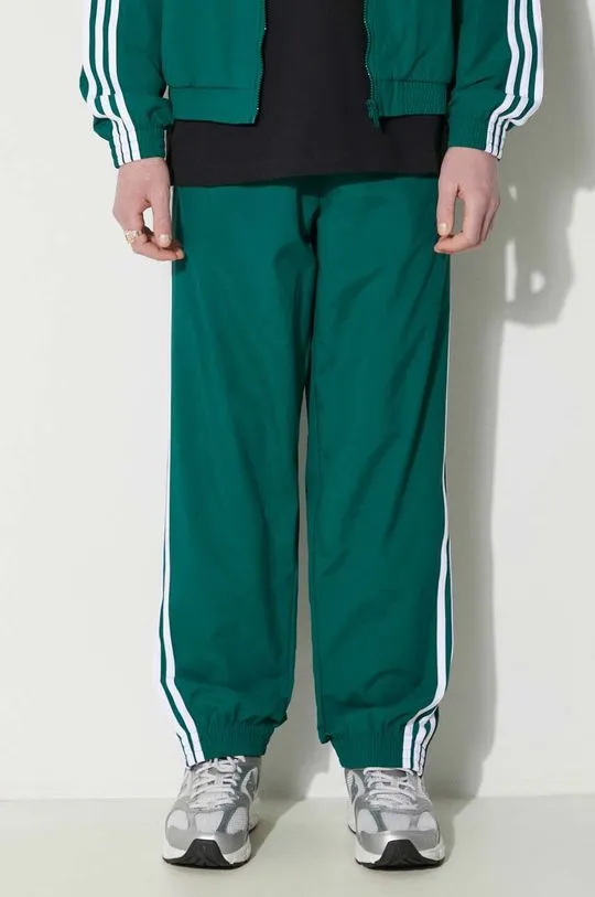 adidas Originals joggers Adicolor Woven Firebird Track Top green color IT2497