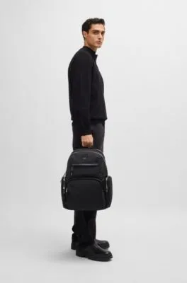 Backpack with leather trims and two-way zip