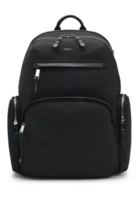 Backpack with leather trims and two-way zip