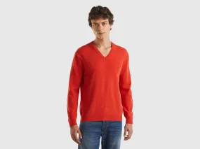 Marl orange V-neck sweater in pure Merino wool - Orange | Benetton