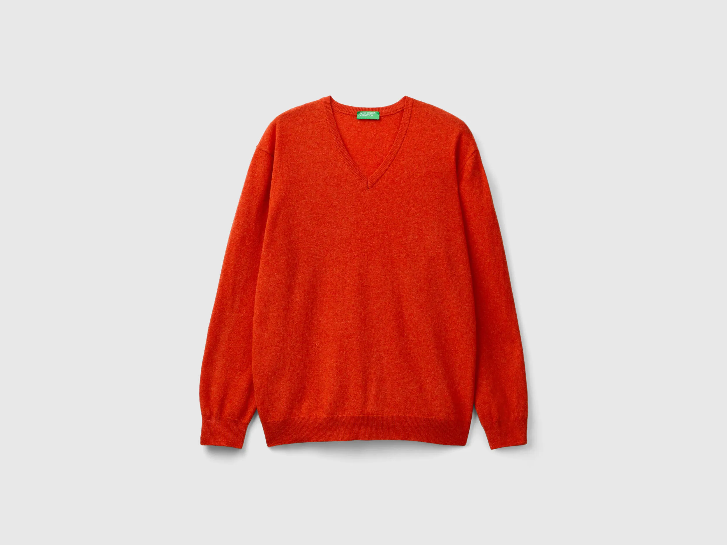 Marl orange V-neck sweater in pure Merino wool - Orange | Benetton